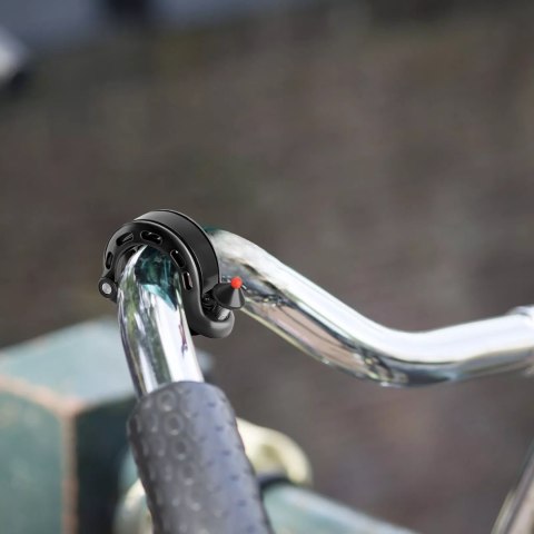 Dzwonek rowerowy w kształcie litery Q 100db - czarny Dzwonek rowerowy w kształcie litery Q 100db - czarny