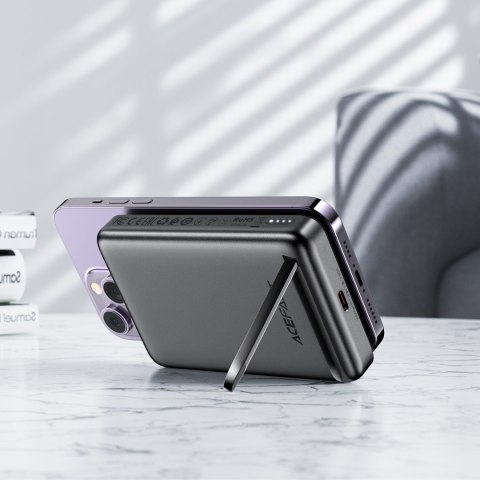 Powerbank 10000mAh indukcyjny magnetyczny z opcją podstawki PD 20W + kabel - czarny Powerbank 10000mAh indukcyjny magnetyczny z opcją podstawki PD 20W + kabel - czarny