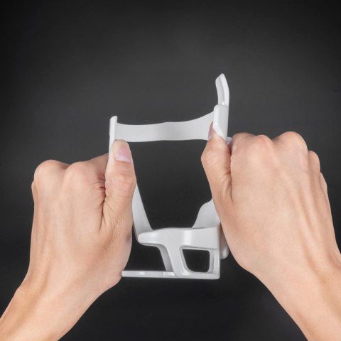 Uchwyt rowerowy z poliwęglanu na butelkę bidon śr. 51-73 mm - biały Uchwyt rowerowy z poliwęglanu na butelkę bidon śr. 51-73 mm - biały